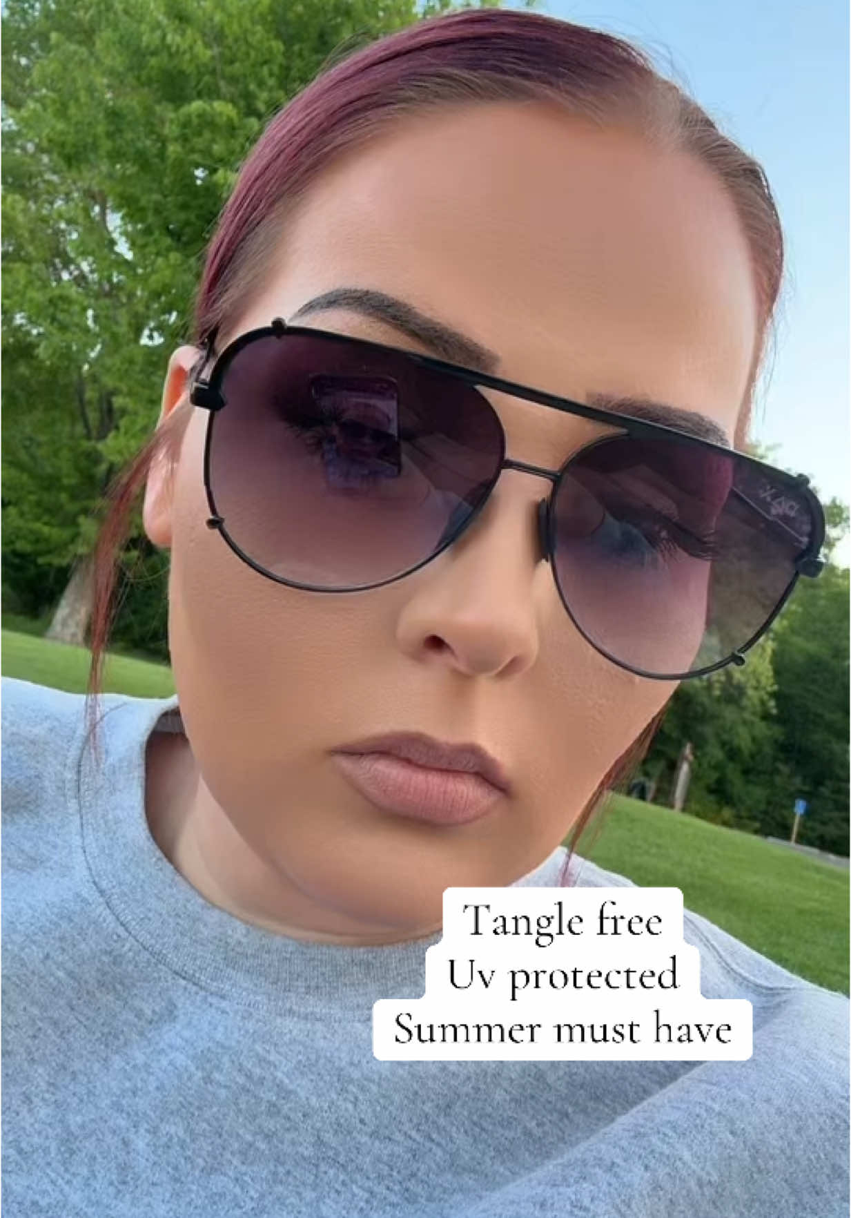 TikTok post by @rebelmomma630 for Dax Eyewear. Caption reads: [...] pulling uv protected aviators from @Dax....