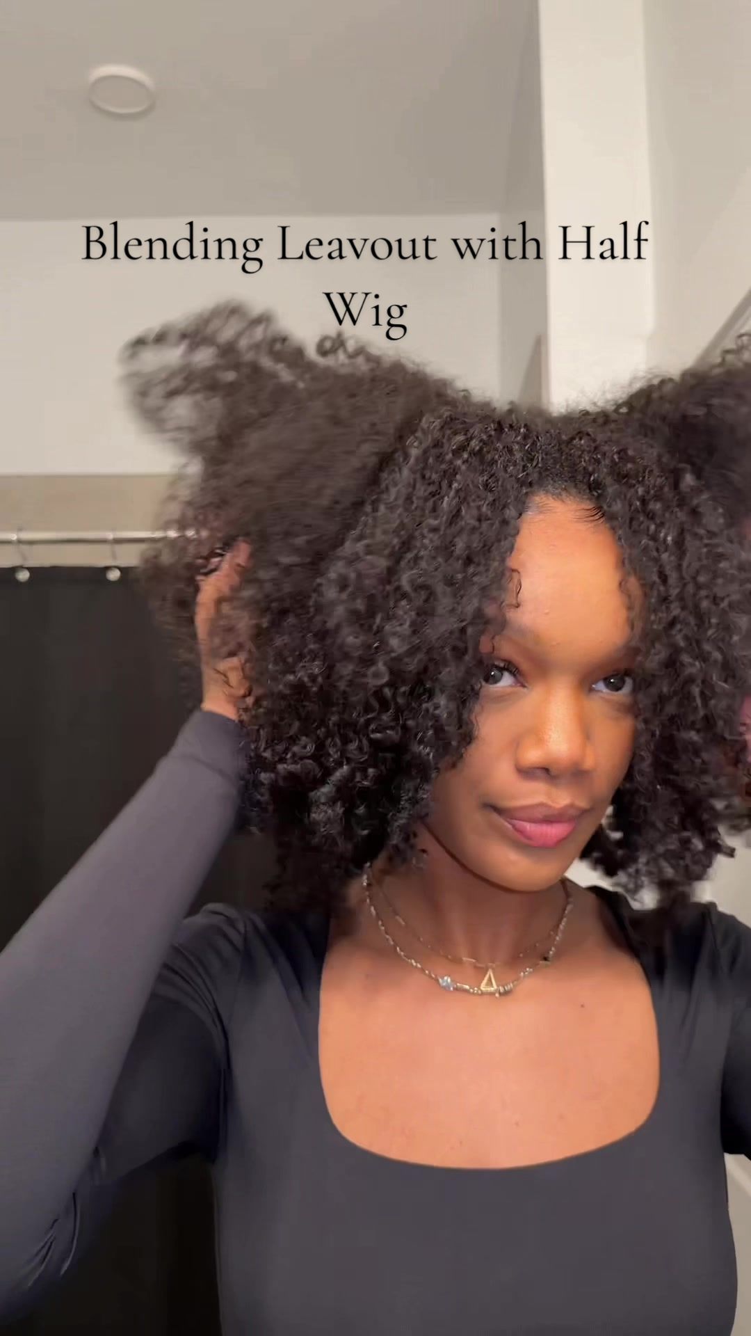 TikTok post by @lonidadi for OQHAIR. Caption reads: [...] #afrocurlywig #leaveout #gymhairstyle....