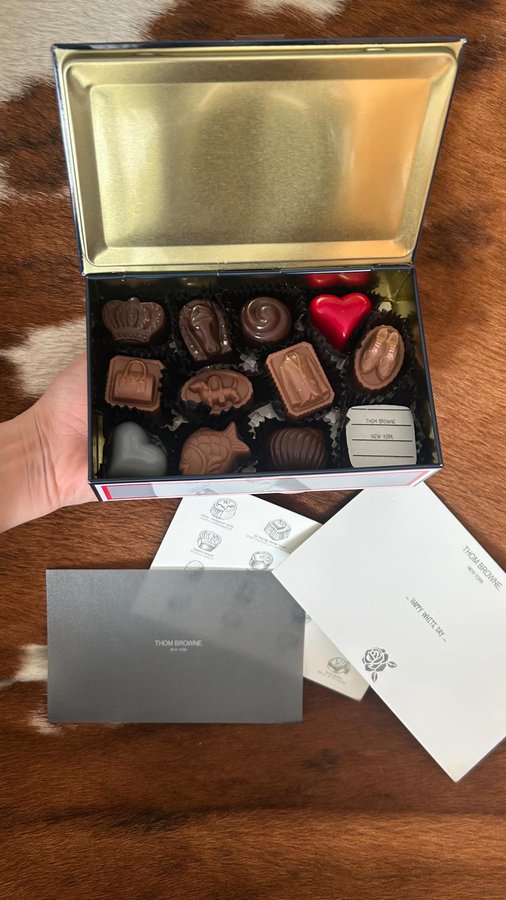 Instagram post by @yuyukmt for Thom Browne. Caption reads: Happy white day from @thombrowne 🐕🎀💝🍫👸🏼....