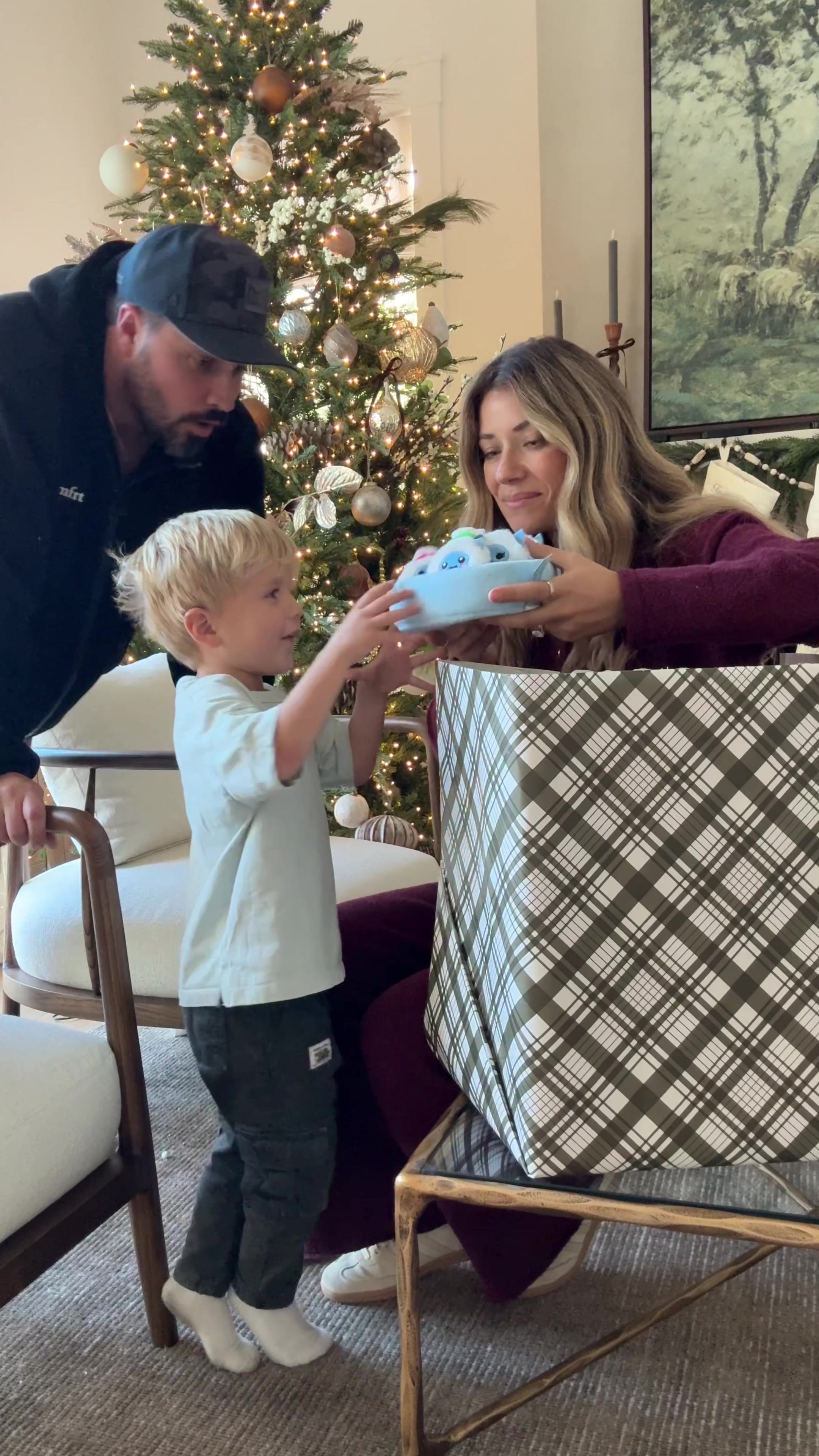TikTok post by @kylerandmad for What Do You Meme. Caption reads: Surprising Cohen with an early Xmas present....