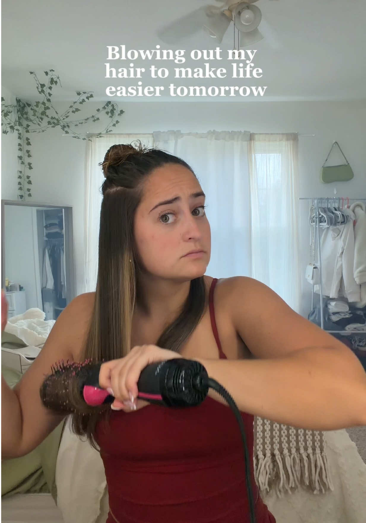 TikTok post by @morgan.elizabith for Revlon. Caption reads: It’s just makes life easier  Blowout brush @Revlon....