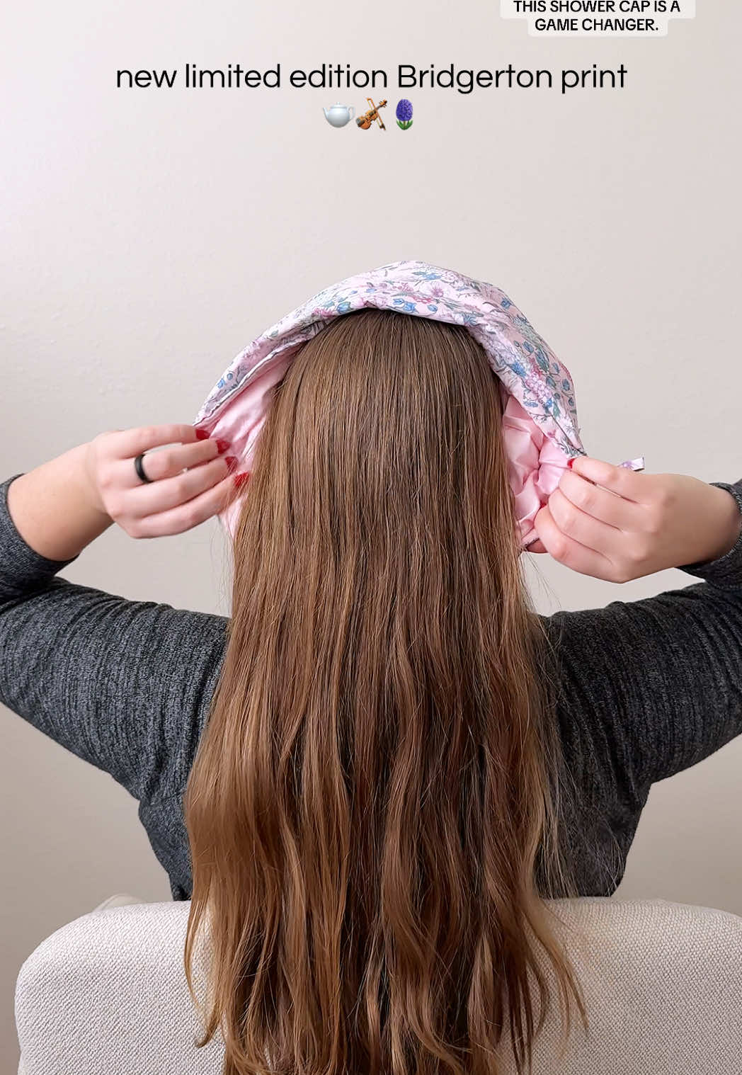 TikTok post by @that_coupon_chick for Kitsch. Caption reads: [...] lined flexi shower cap from kitsch 🫖🎻🪻....