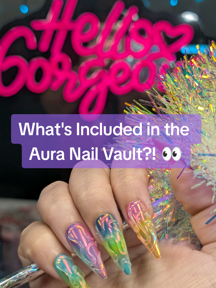 TikTok post by @thatdotspotgirl for Nailboo. Caption reads: What all comes in the @Nailboo Ultimate Aura....