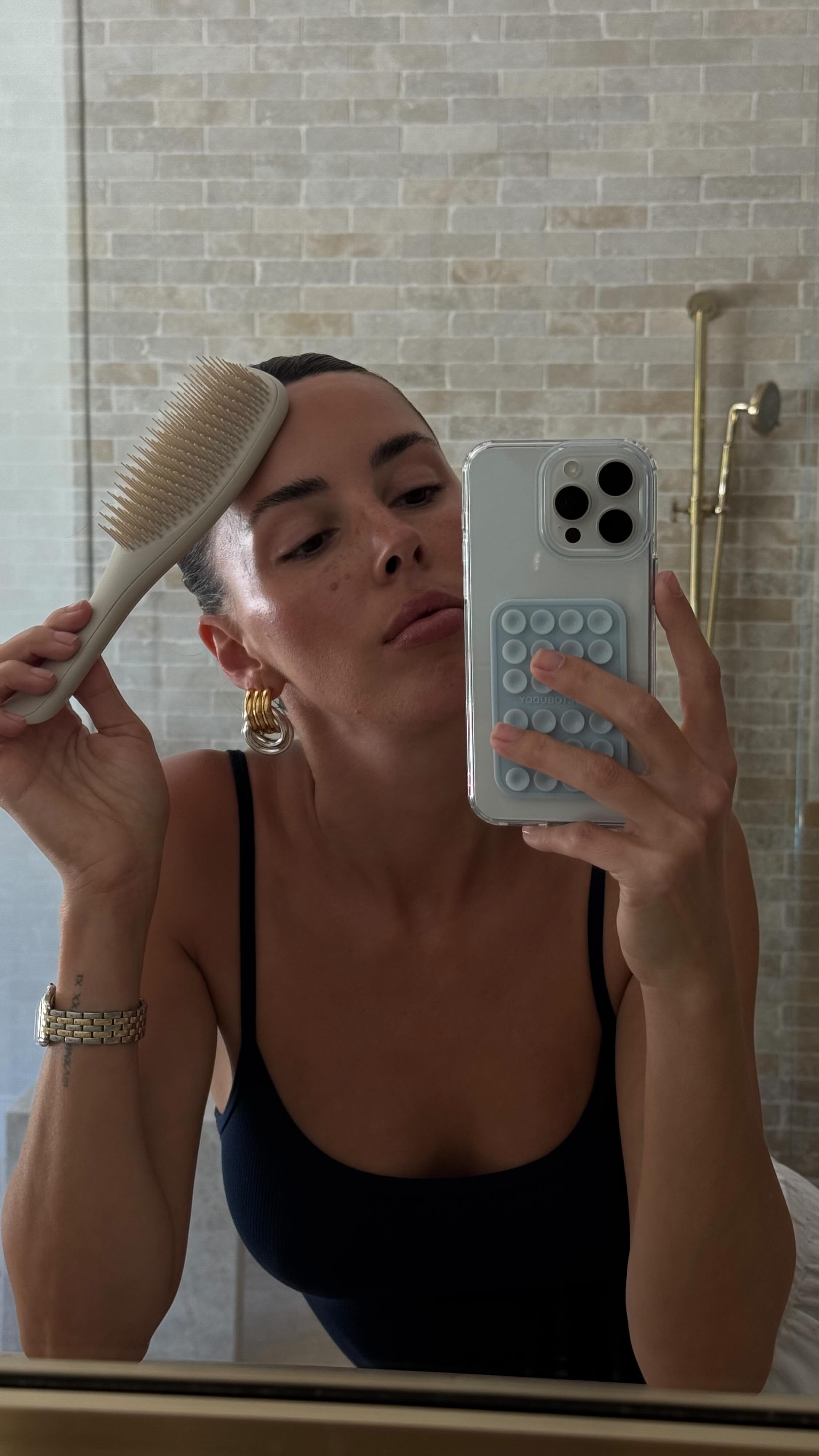 Instagram post by @sivanayla for Tangle Teezer. Caption reads: High or low bun, what’s your vibe? 🩰🎀

Styling....