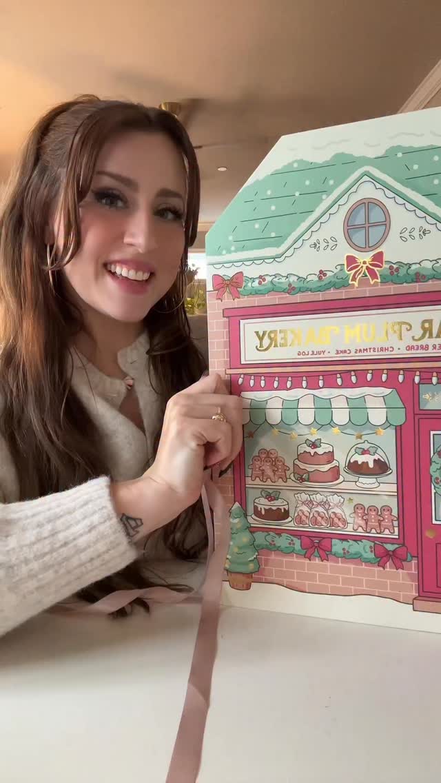 Instagram post by @rosymaplesloth for Sanrio. Caption reads: Open day 12 of my Sanrio advent calendar with me!....