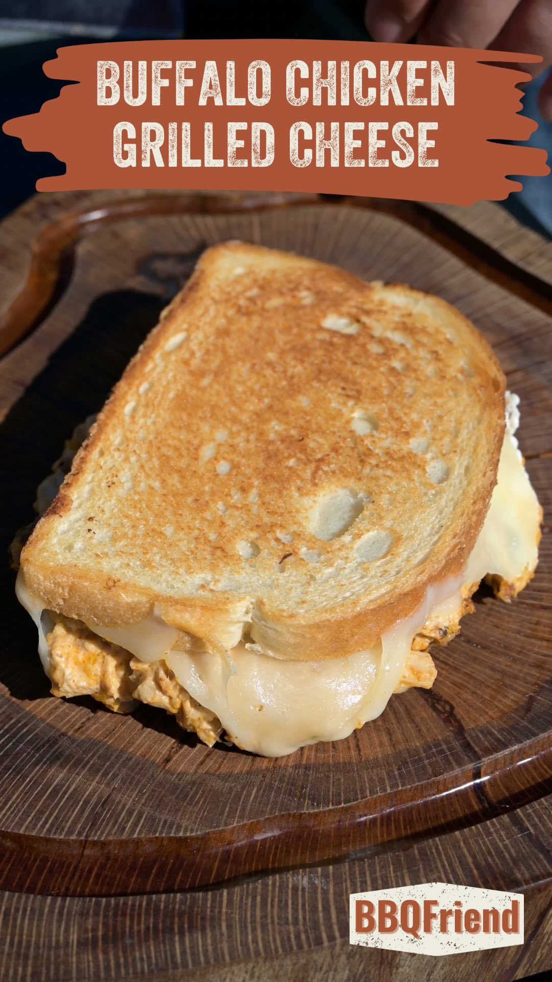 Instagram post by @bbqfriend for Napoleon Grills. Caption reads: Buffalo Chicken Grilled Cheese! Think buffalo....