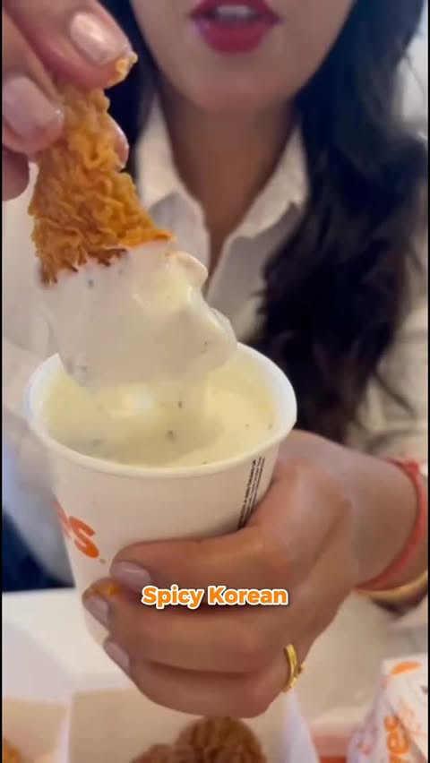 Instagram post by @freesoulindiantraveller for Popeyes. Caption reads: [...] choosing? #ad #dipdripdigin #popeyesindia....