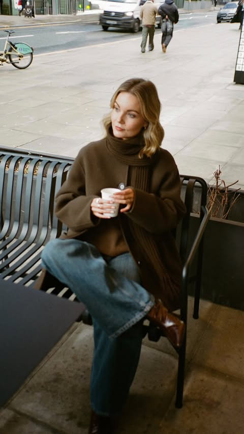 Instagram post by @ninaleacaine for DISSH. Caption reads: 5 coats I’ve had on rotation recently, let me know....