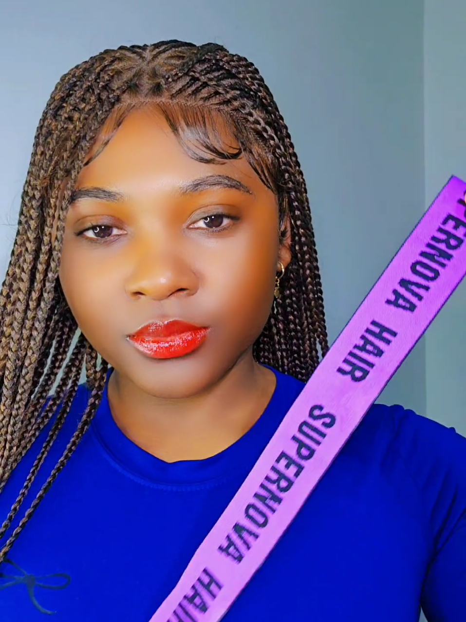 TikTok post by @fazionboutique for Supernova Hair. Caption reads: [...] #africanhairstyle #supernova @Supernovahair.