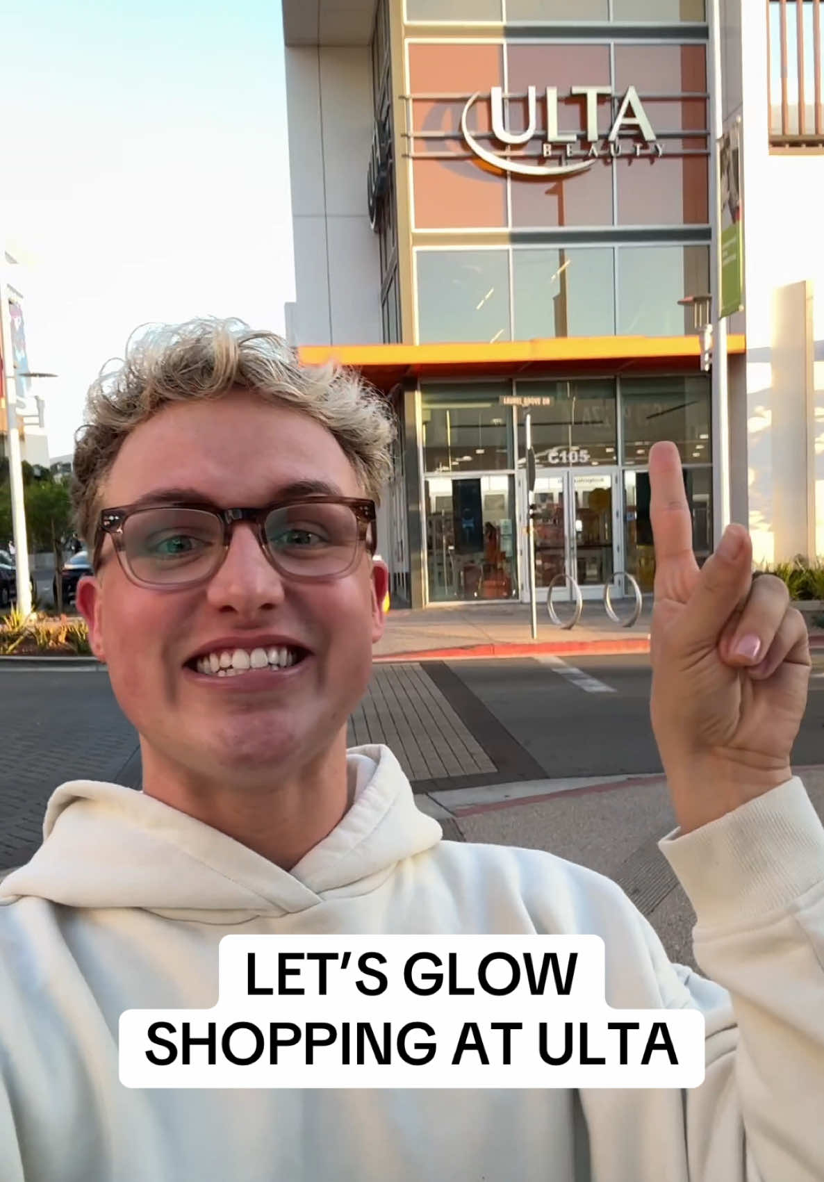 TikTok post by @gaymanwithaspraytan for Bondisands. Caption reads: [...] Here We Glow event! #BondiSands....