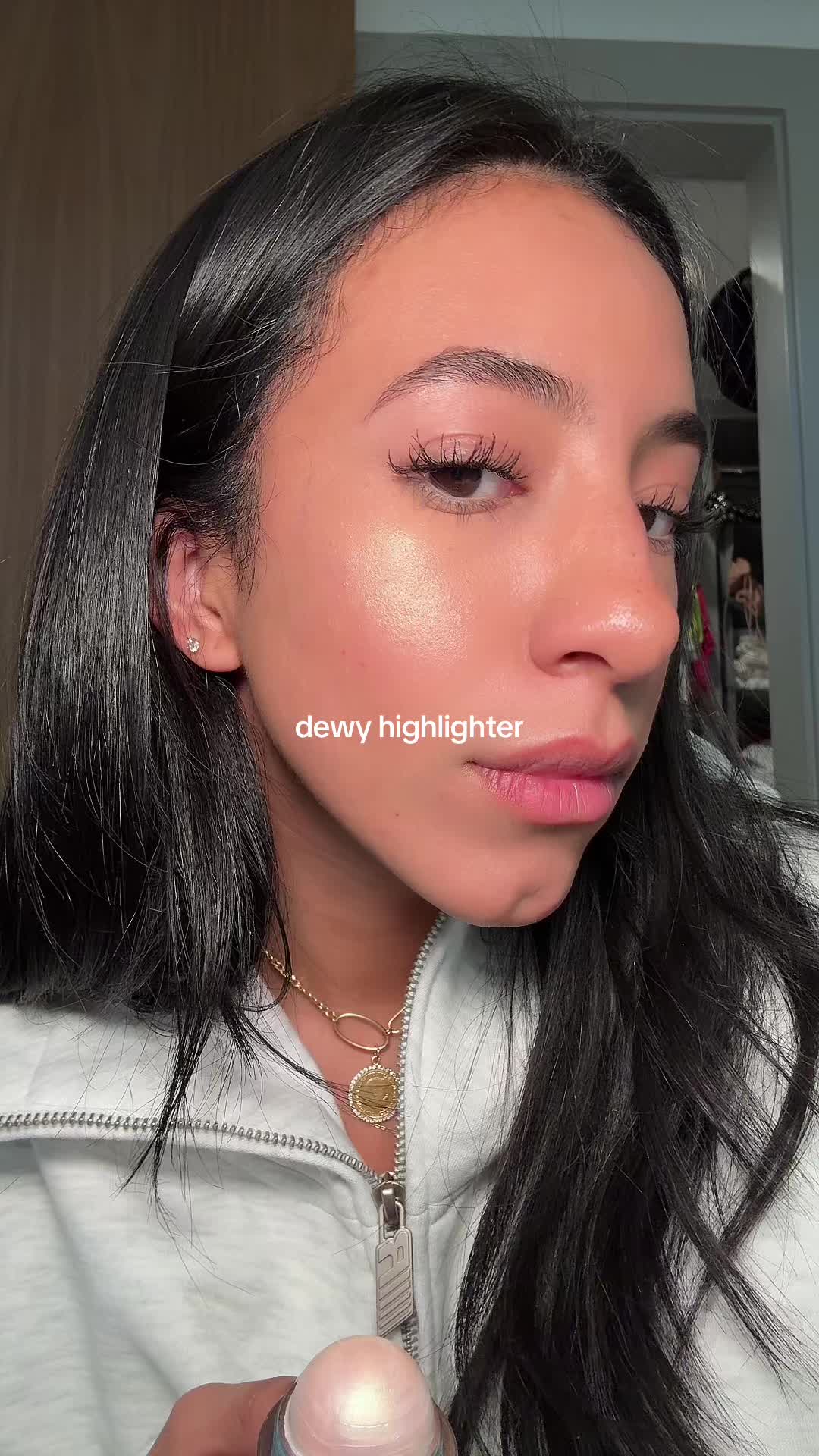 TikTok post by @italiajjacqueline for Godmode Beauty. Caption reads: [...] #dewyhighlighter #dewyskin #makeup @GODMODE....