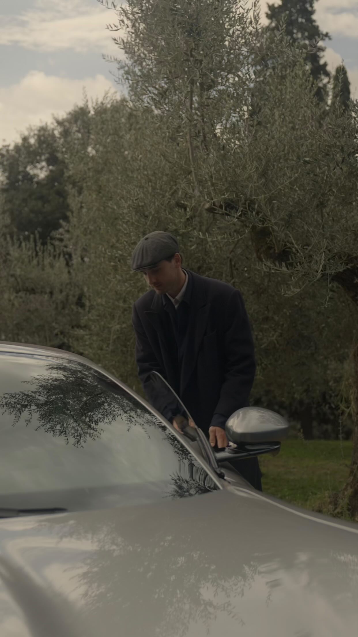 Instagram post by @pignattifederico for Ferrari. Caption reads: [...] roads, and cypress-lined alleys, the....