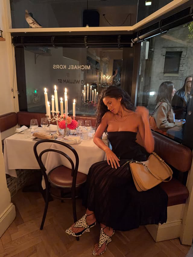 Instagram post by @jasminettavares for Michael Kors. Caption reads: wined and dined w the girls and @michaelkors, what....