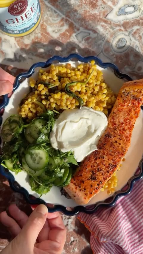 Instagram post by @saturdaytable for 4th & Heart. Caption reads: Seared salmon, lemony pearl couscous, a fresh....
