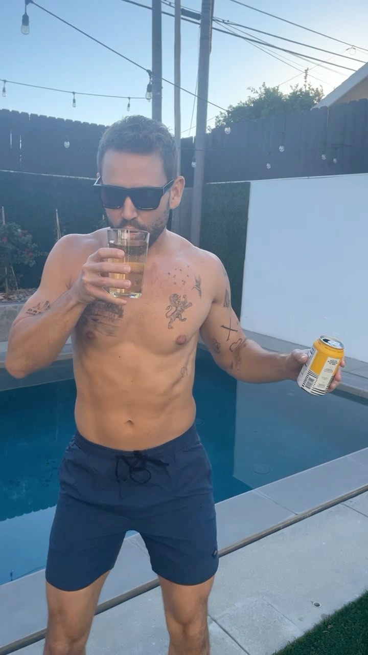 Instagram post by @nickviall for Hopwtr. Caption reads: @hopwtr helps me unwind after a long day with....