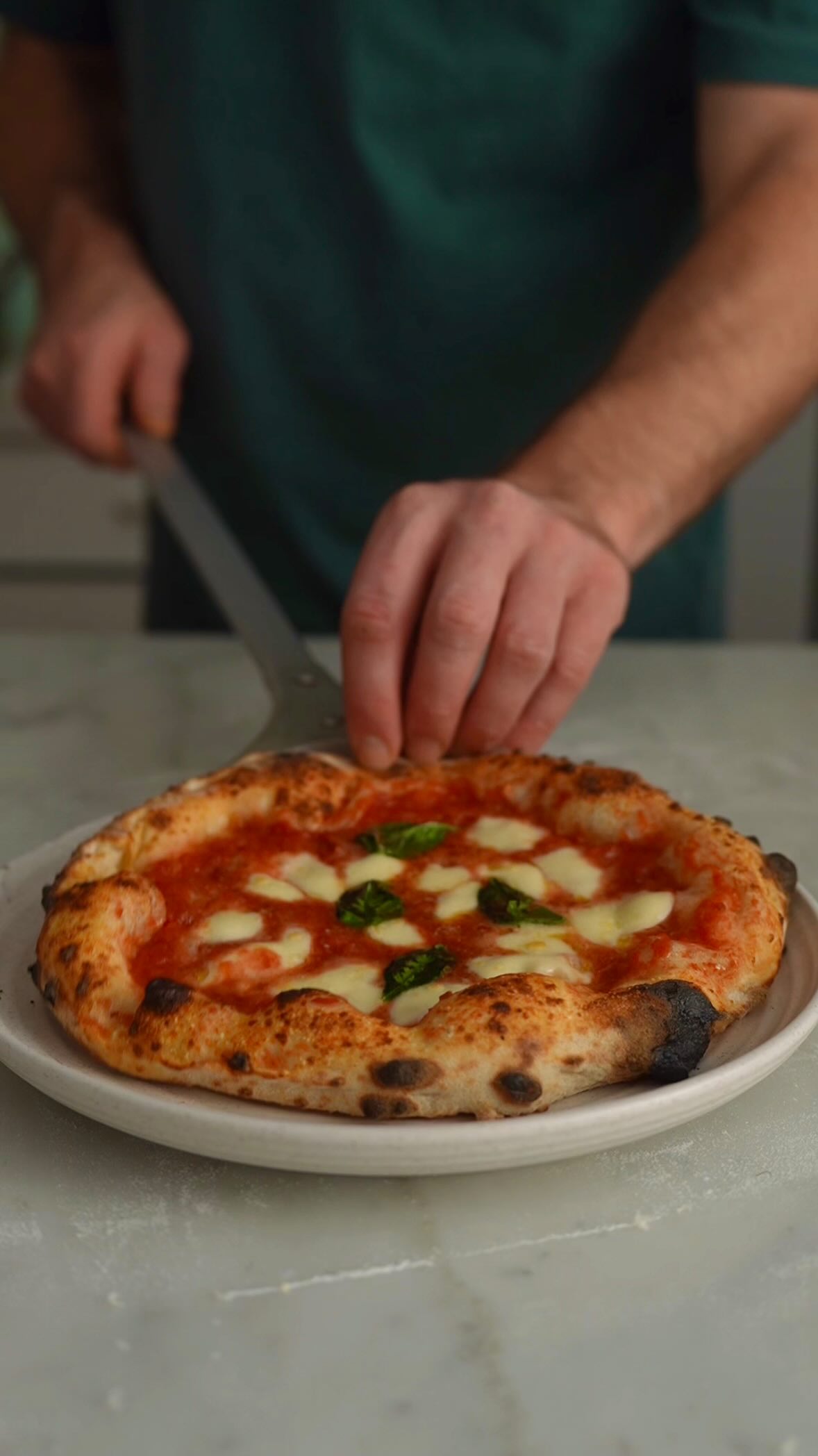 Instagram post by @theoneeighthitalian for Ooni. Caption reads: [...] - @basile_imports 🔥 Baked in Ooni Koda 16....