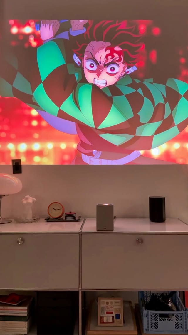 Instagram post by @adenwang for LG USA. Caption reads: The best mini 4K UST projector I’ve tried!  The LG....