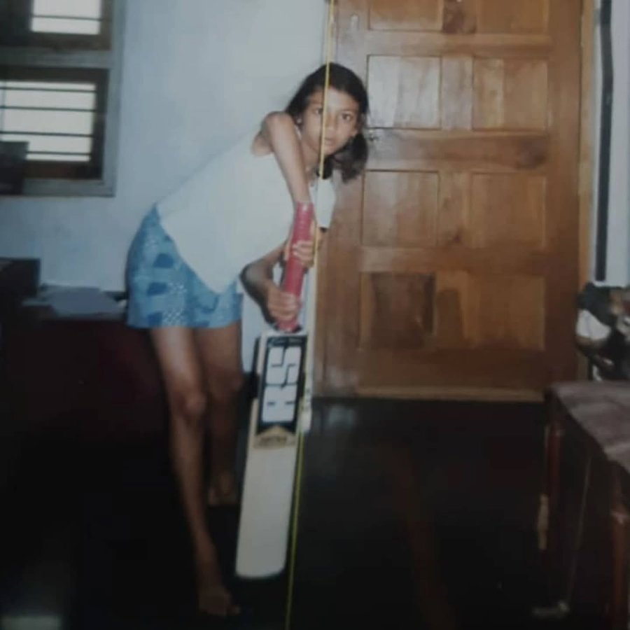 Instagram post by @smriti_mandhana for UNICEF. Caption reads: When I was seven years old, I could barely lift....