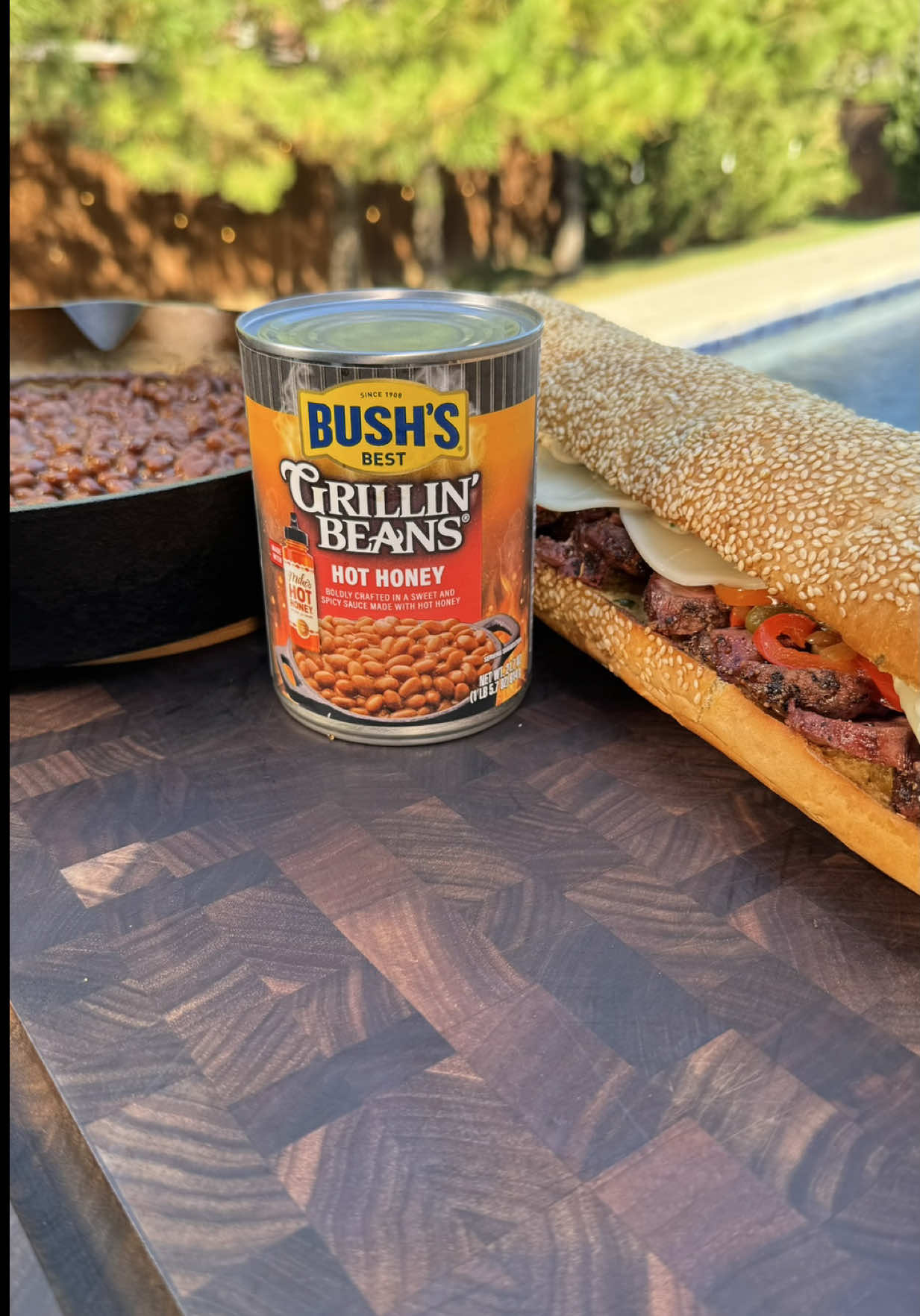 TikTok post by @jenksbbq for Mike's Hot Honey. Caption reads: #BushsBeansPartner @Bush’s Beans Grillin’ Beans....