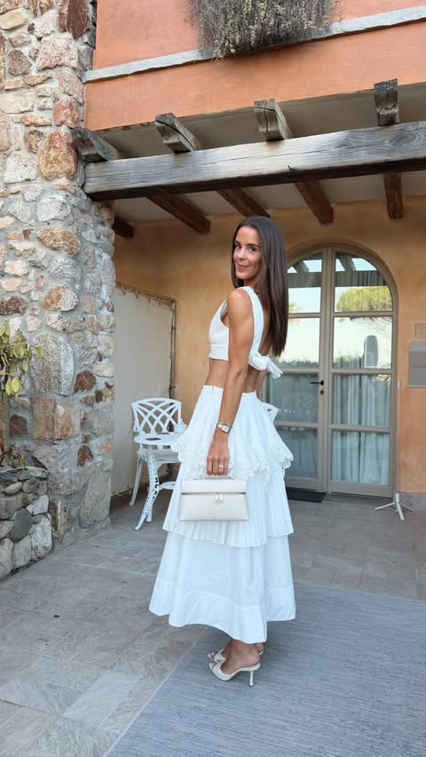 Instagram post by @whatemwore for Karen Millen. Caption reads: ad outfits I’ve worn on my honeymoon so far....
