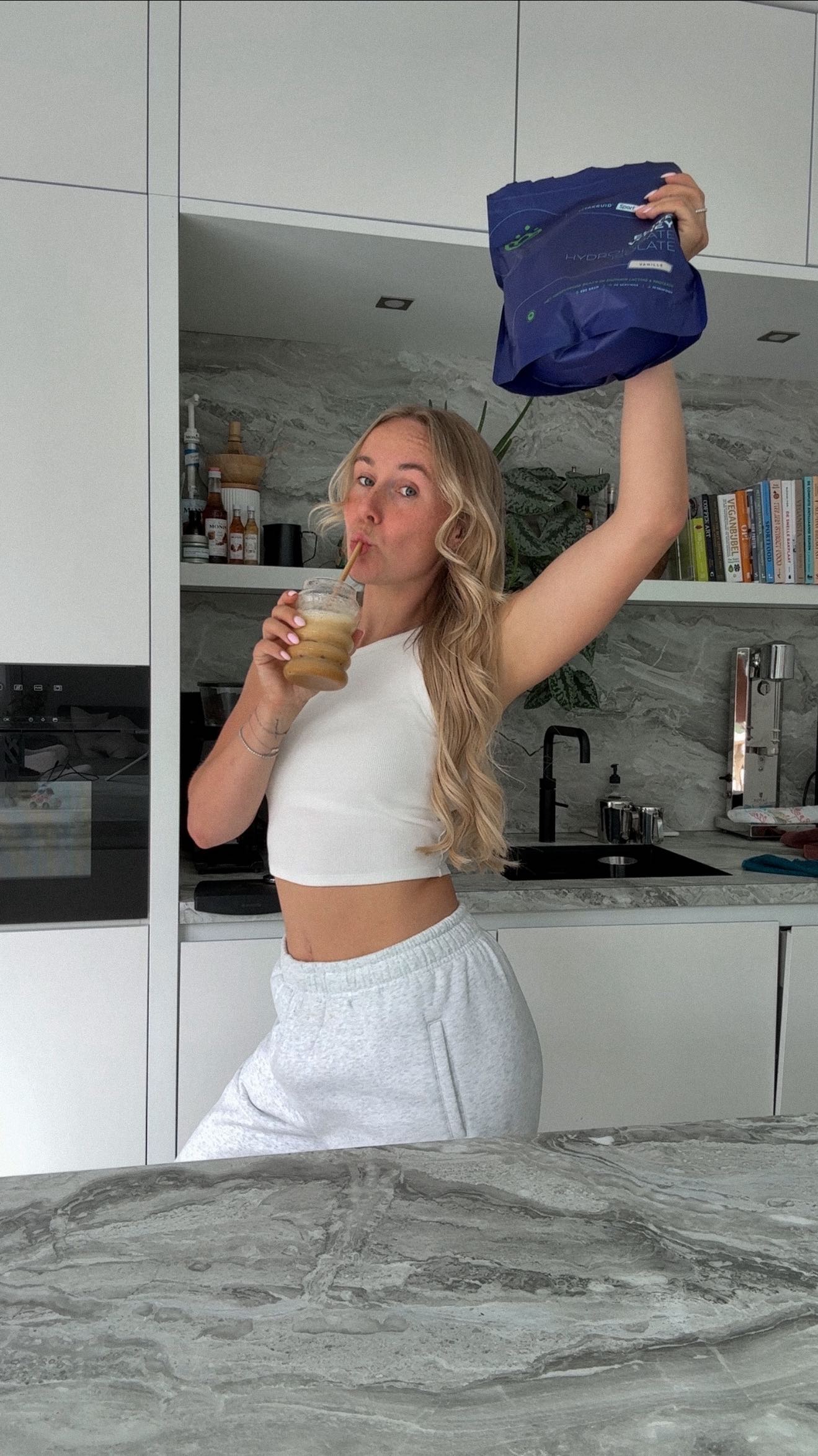 Instagram post by @myronkoops for Vitakruid. Caption reads: Who knew iced coffee and Vitakruid Elite Whey....