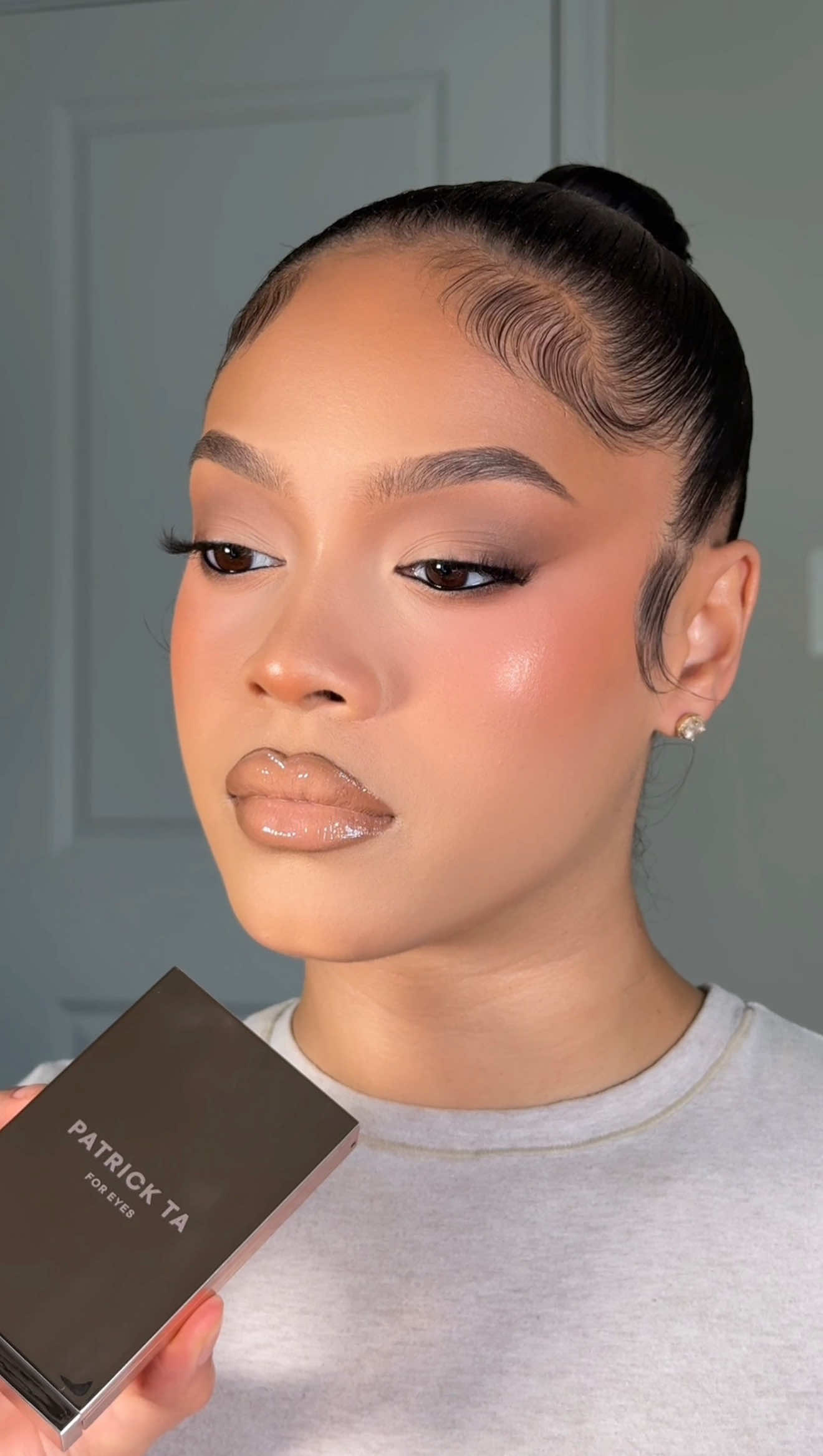 TikTok post by @logannicolemua for Patrick Ta. Caption reads: [...] neutral eyeshadow using the NEW @Patrick Ta....