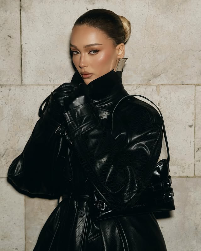 Instagram post by @romaneinnc for KARL LAGERFELD. Caption reads: Paris by night, wrapped in @karllagerfeld leather....