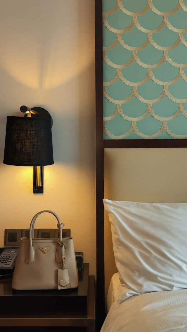 Instagram post by @fun.adventuress for Hilton. Caption reads: ⭐️⭐️⭐️⭐️⭐️ Checking in to the most elegant hotel....
