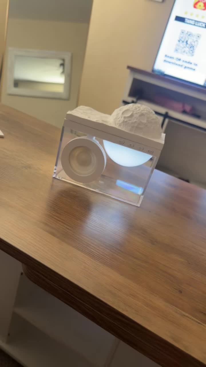 TikTok post by @ur_fav_homegirl87 for Kati Beauty NYC. Caption reads: @Kati Beauty NYC #bluetooth #decor #moonspeaker....