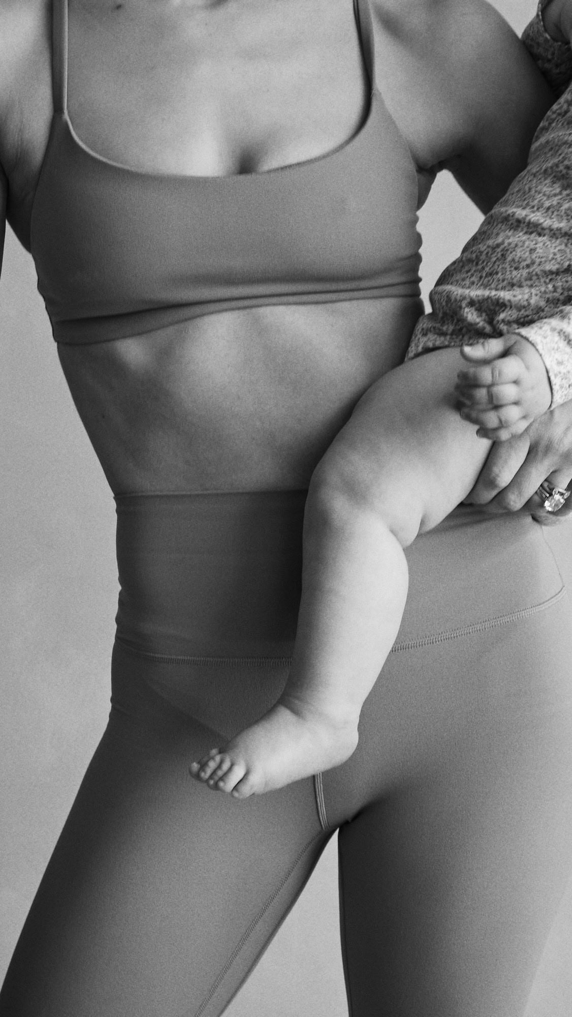 Instagram post by @katyschuele for The Sculpt Society. Caption reads: No one should navigate postpartum alone. That’s....