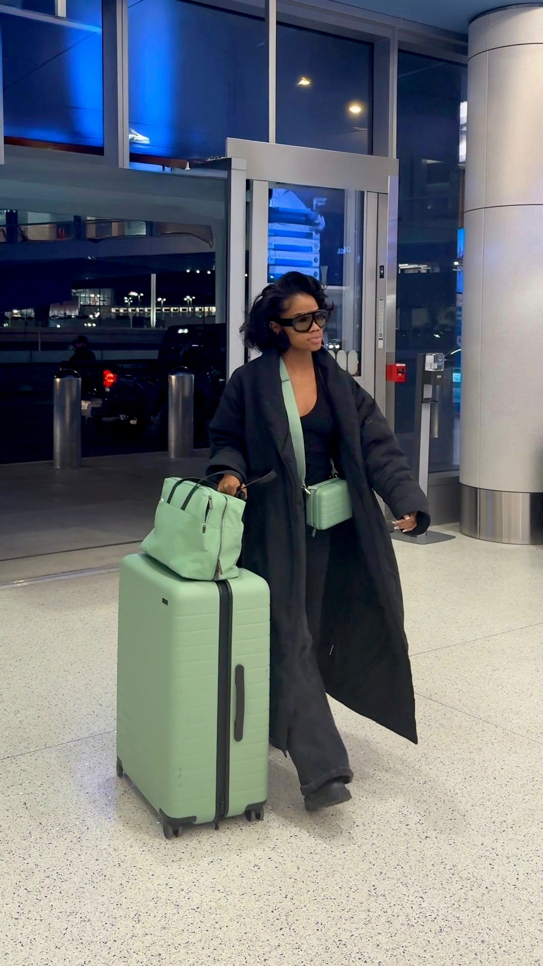 Instagram post by @donyetaylor for Away. Caption reads: Becoming Type A: Ep 2 – Color Coded Travel ✈️
I....