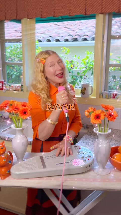 Instagram post by @blondincar for KAYAK. Caption reads: 🎶 When I go on tour, I go to @kayak 🎶 🧡 Big....