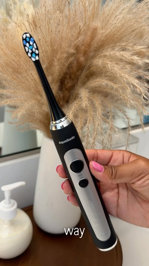 Instagram post by @kaylababatunde for AquaSonic. Caption reads: [...] time to upgrade my toothbrush. The AquaSonic....