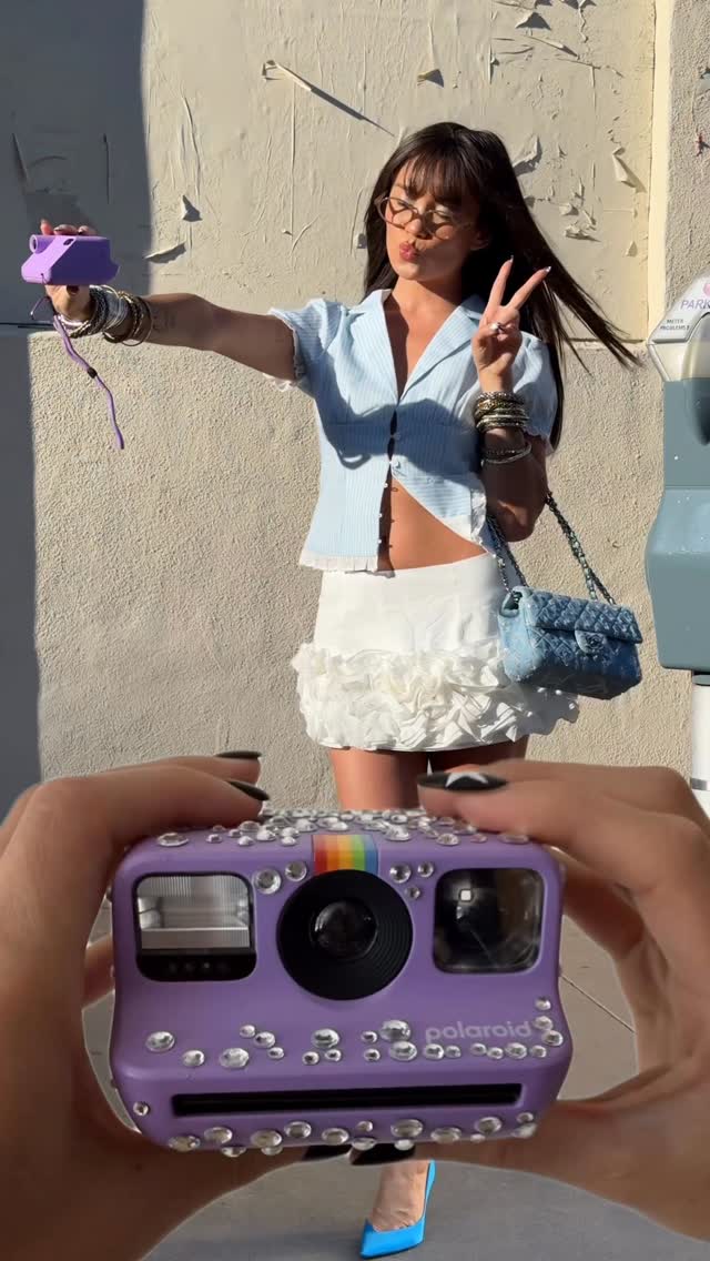 Instagram post by @summerrachelwarren for Polaroid. Caption reads: capturing tangible memories: priceless @polaroid....