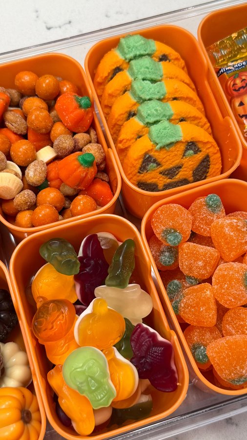 Instagram post by @kate_cleanhome for Chomps. Caption reads: [...] Snack Box Restock 🍂🎃🍫🍪🧡 #chompspartner....