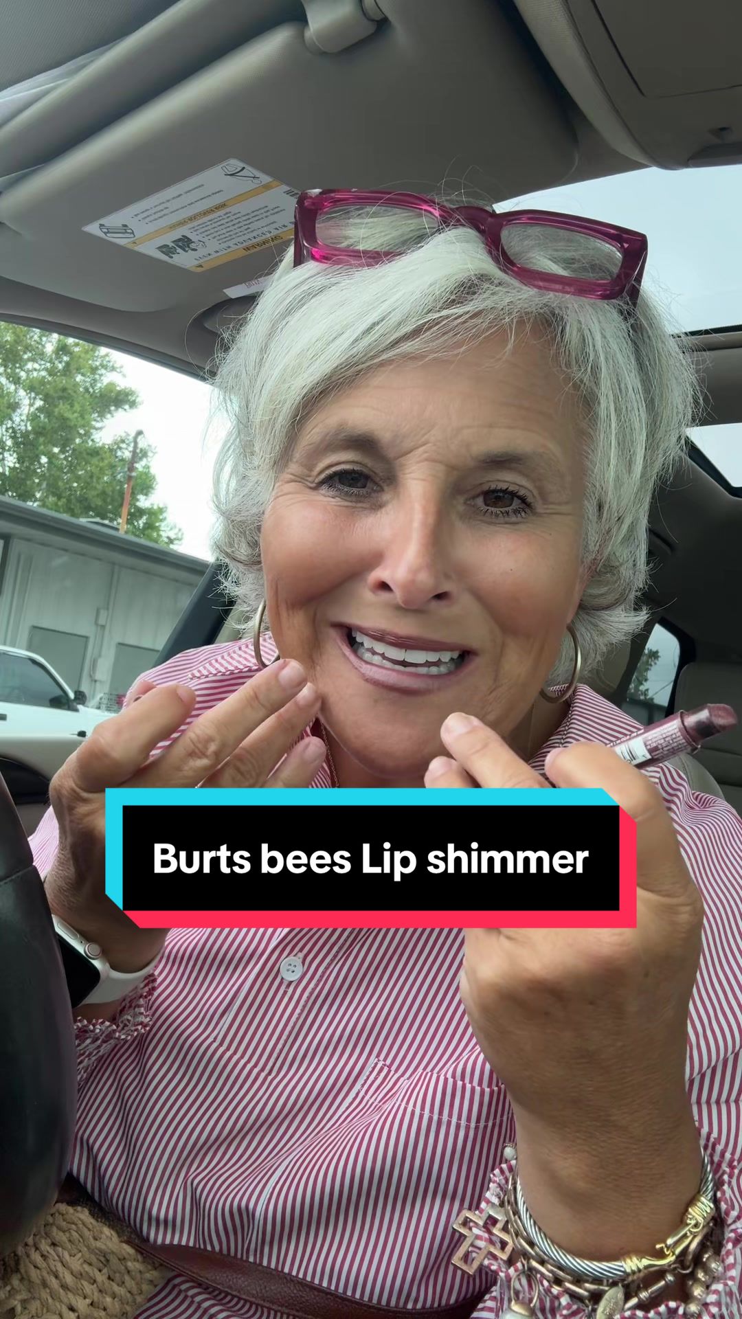 TikTok post by @the.lynnadcox for Burt's Bees. Caption reads: @Burt's Bees my favorite lip shimmer that keeps my....