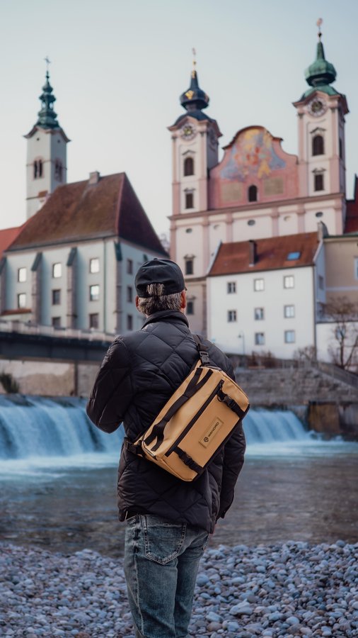 Instagram post by @ogik_jatmiko for Wandrd. Caption reads: The ROGUE Sling by @wandrd is my go-to for those....