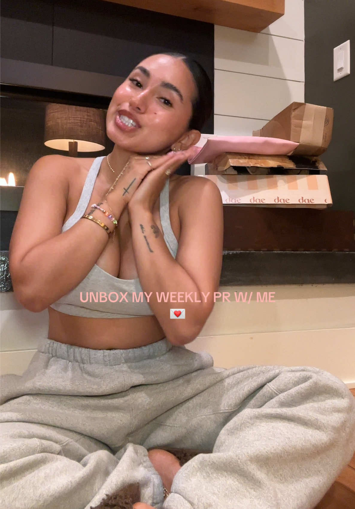TikTok post by @kayteportillo for Amika. Caption reads: [...] #unboxingvideo #cleanbeauty @EADEM @amika....