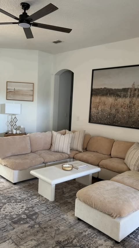 Instagram post by @itsashlynlaila for Nolan Interior. Caption reads: [...] room feel so cozy 🤎☁️ #homecleaning....